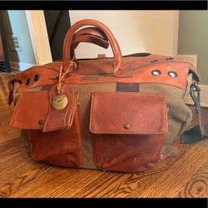 Canvas and leather convertible travel duffel